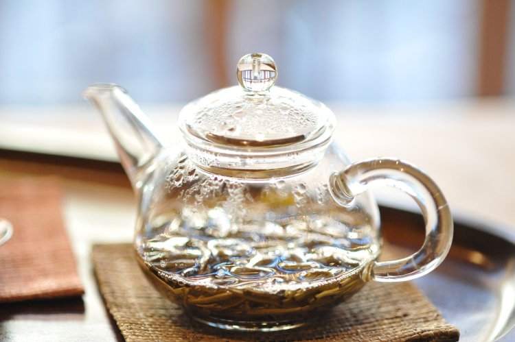 Jasmine tea in glass kettle